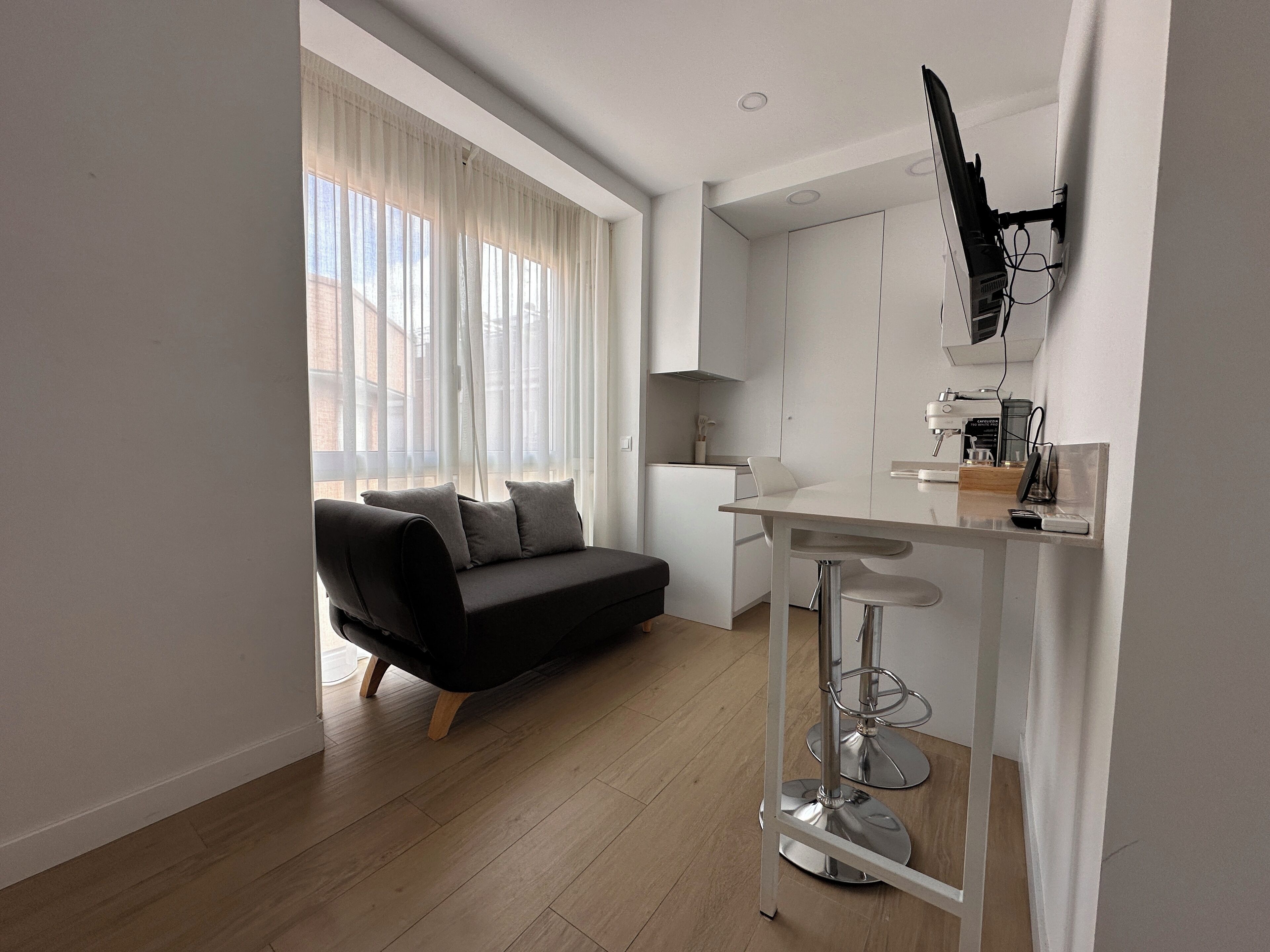 Mini-fridge, microwave, stovetop, cookware/dishes/utensils