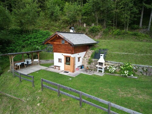 Cozy Chalet surrounded by greenery and secluded at the foot of the Dolomites