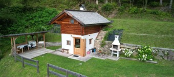 Cozy Chalet surrounded by greenery and secluded at the foot of the Dolomites