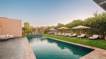 15 outdoor pools, sun loungers