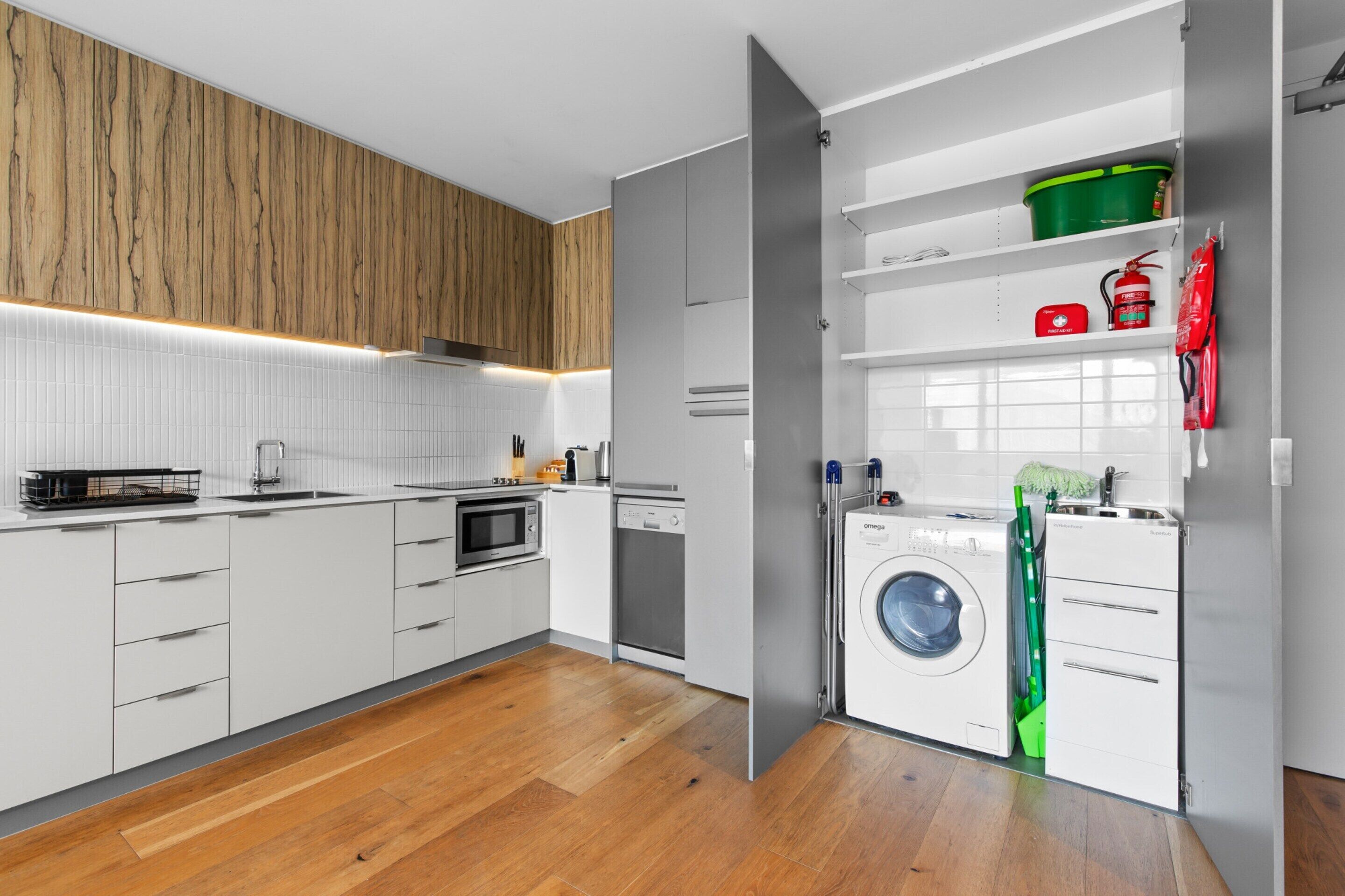 Apartamento | Cocina privada | Frigorífico, microondas, placa de cocina y lavavajillas