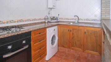 Apartment | Private kitchen | Cleaning supplies