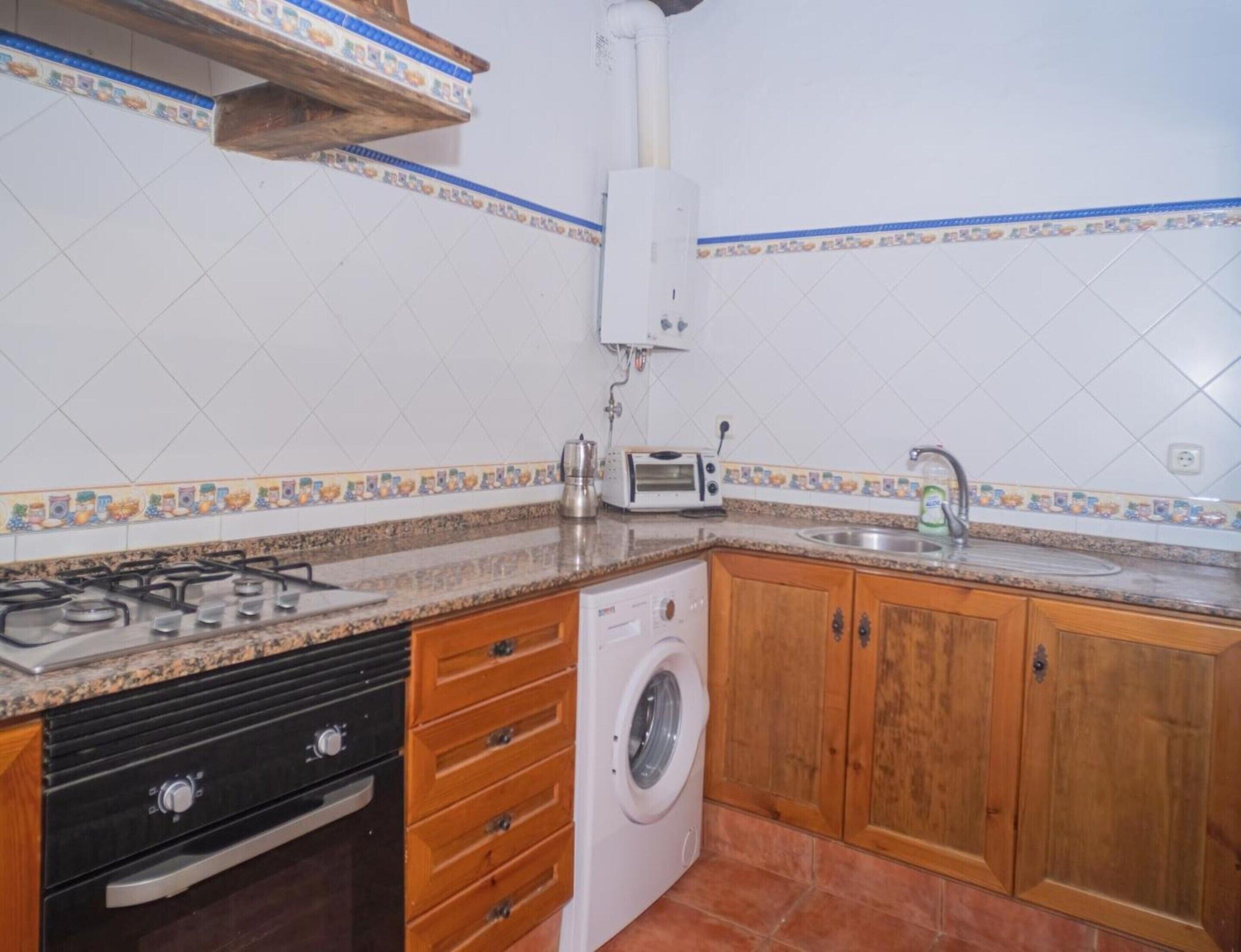 Apartment | Private kitchen | Cleaning supplies