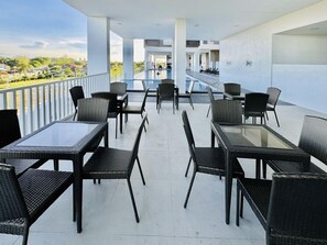 Outdoor dining - WV Towers - Spacious 2BR Condo with Balcony (Iloilo City)