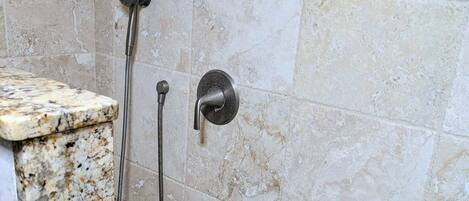 Shower, towels, soap, toilet paper