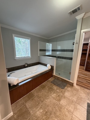 Jetted tub, hair dryer, towels, soap