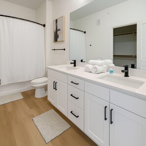 Bathroom - King 1BR · Near Dining · Pool & Gym Laundry Access (Sherman)