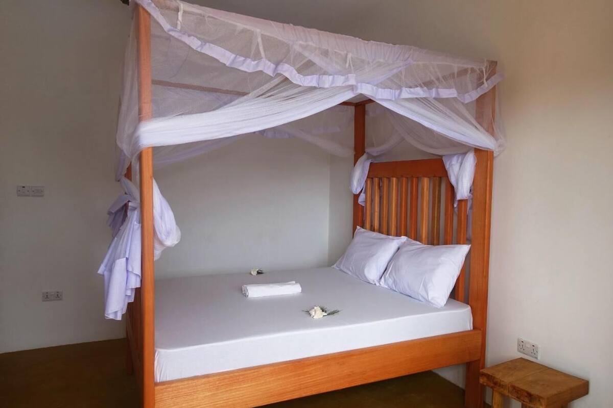 Habitación individual Deluxe, vista al jardín | Escritorio, espacio para trabajar con laptop y wifi gratis