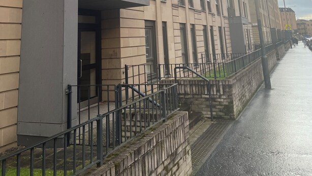 A multi-story building with a modern architectural style, featuring a series of balconies and large windows. - Maison 109 Suite (Glasgow)