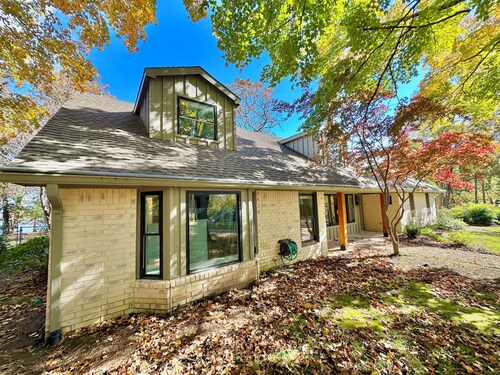 Quiet location on Lake Hudson.  Waterfront, large dock with slip,