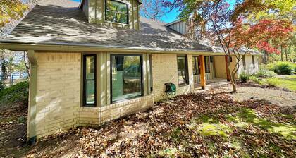 Quiet location on Lake Hudson. Waterfront, large dock with slip,