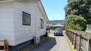 Unclassified image, 2 of 24, button - Short walks to Beach & Town. Large deck with BBQ. Super Fast Internet, 85" Tele (Whangamatā)