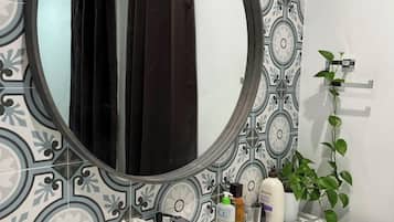 Shower, hair dryer, bidet, toilet paper