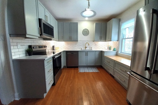 Kitchen; stainless appliances, quartz counter, soft close doors & drawers