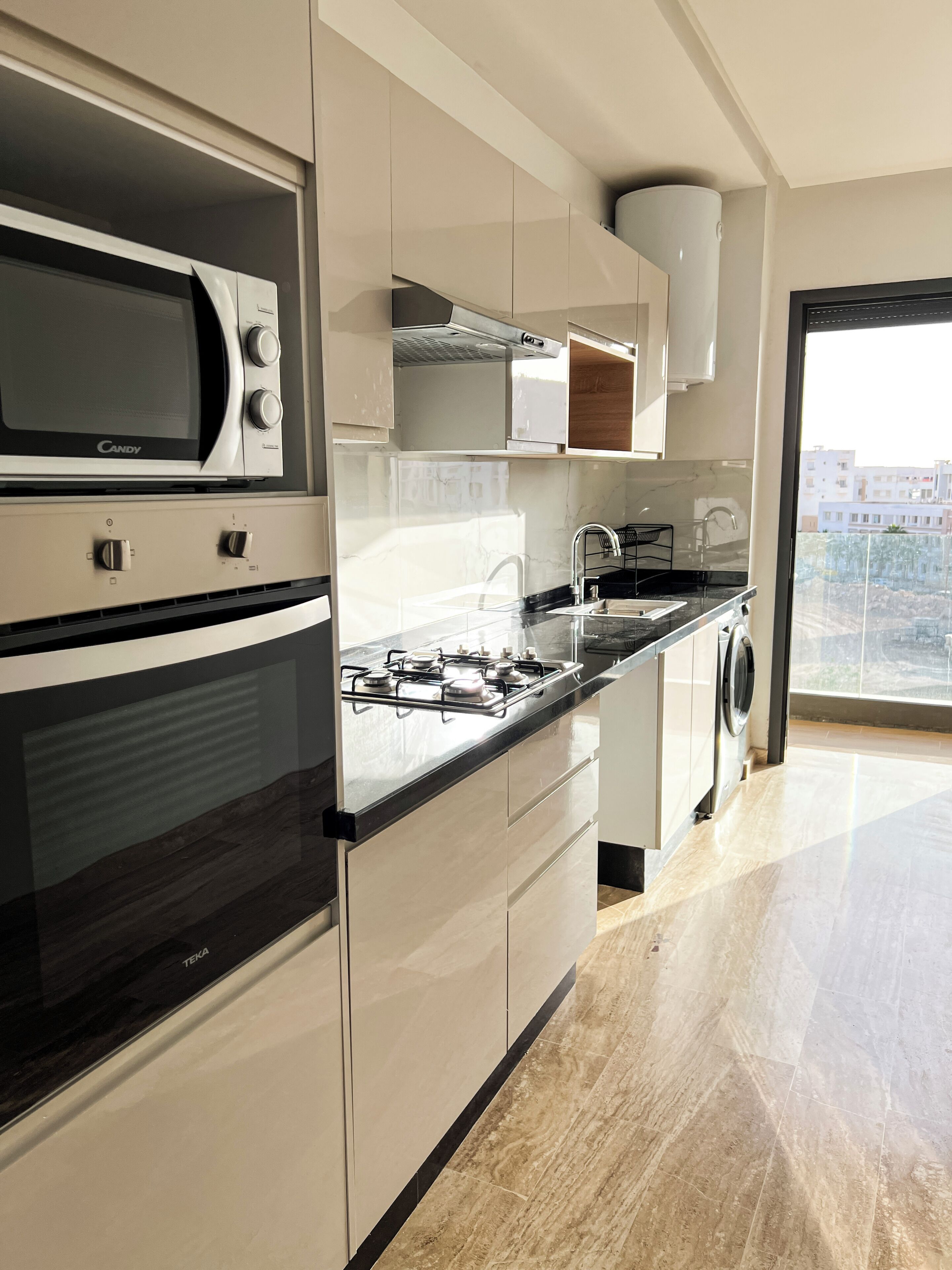 Fridge, microwave, stovetop, coffee/tea maker