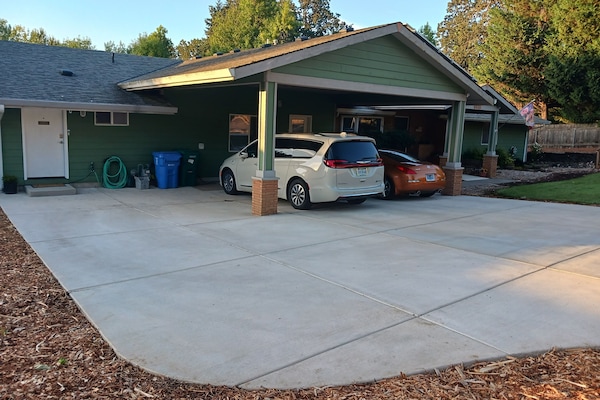 Guest Front Entrance and Parking. Outlet provided for level-1 EV charger.