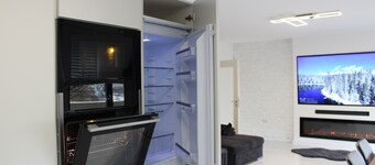 Central apartment with XXL TV/Wlan, fully equipped kitchen & fireplace