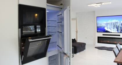 Central apartment with XXL TV/Wlan, fully equipped kitchen & fireplace