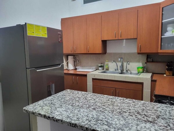 Private kitchen - Beautiful and cozy home with Rent a car available (Nejapa)