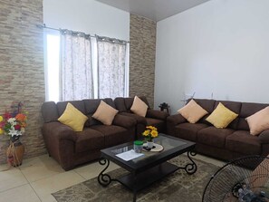 Living area - Beautiful and cozy home with Rent a car available (Nejapa)