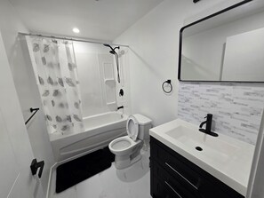 Hair dryer, towels, soap, shampoo