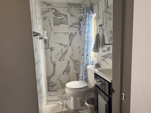 Hair dryer, towels, soap, toilet paper