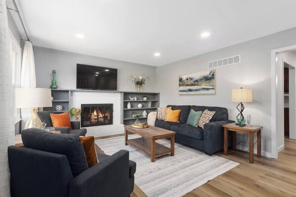 Smart TV, fireplace, foosball