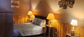 Cozy 3-bedroom motel in Bartley ideal for hunters or families.