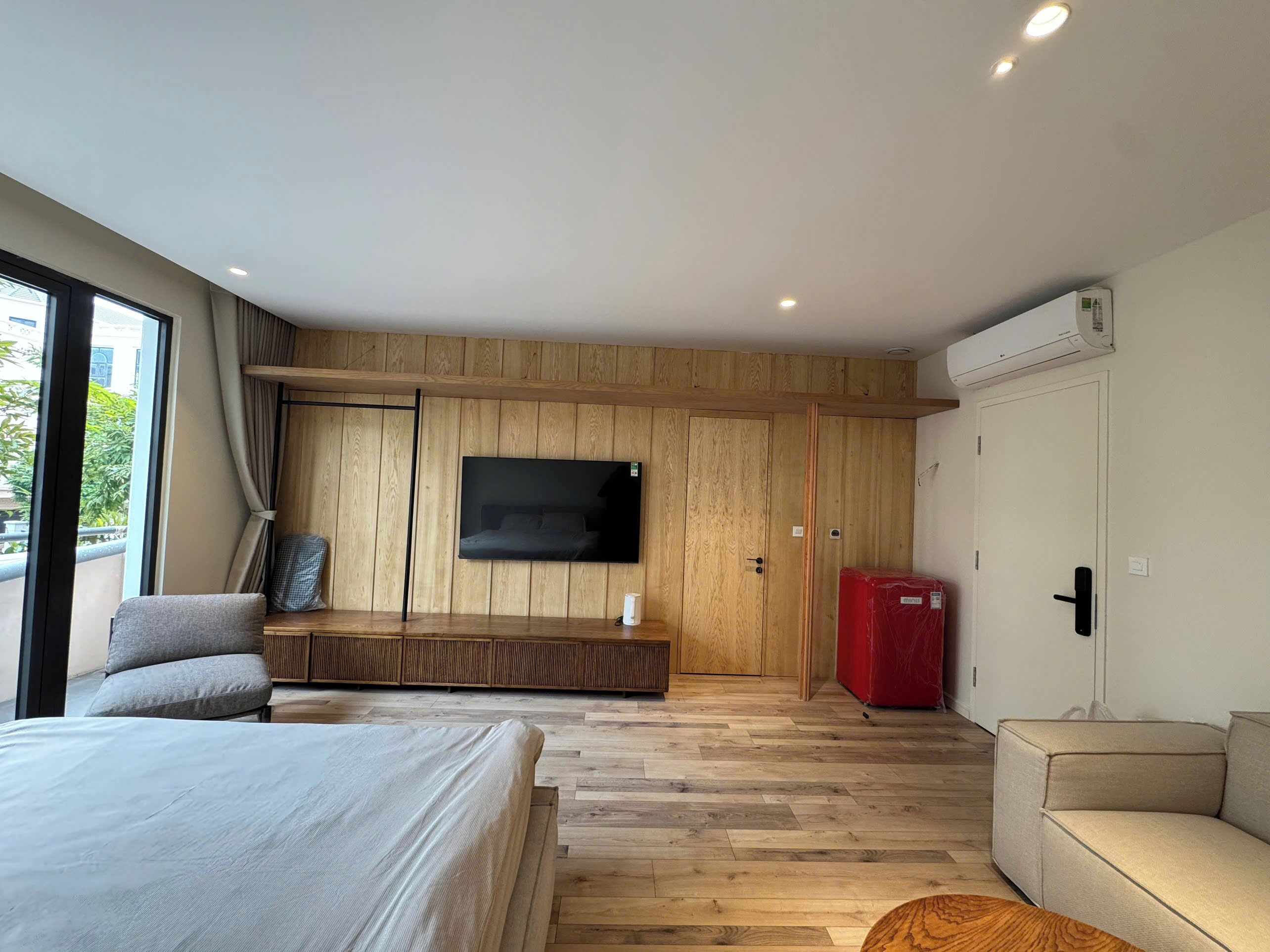 Deluxe-værelse - udsigt til have | Opholdsområde