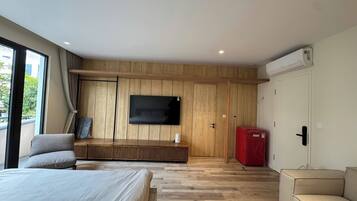 Rom – deluxe, hageutsikt | Oppholdsområde