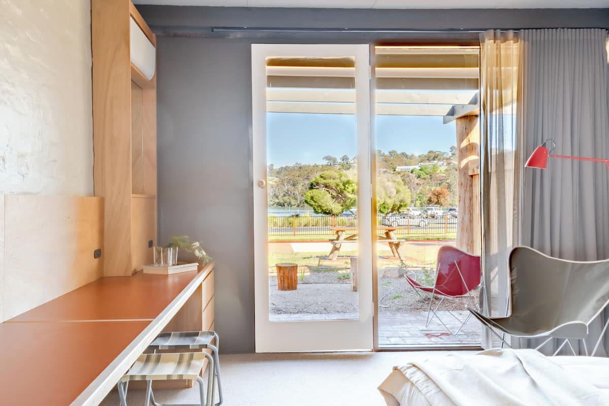 Studio Suite, Patio, Lake View | Desk, laptop workspace, iron/ironing board, free WiFi