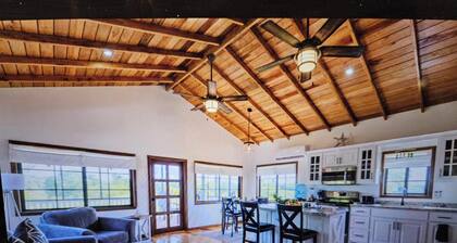 Contemporary 3-BR Vacation Home with A/C & Sea-Breezes steps from beach