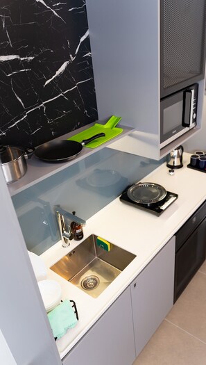 Economy Apartment, 2 Bedrooms, City View | Private kitchen | Fridge, microwave