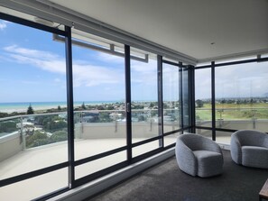 Panoramic Apartment, Ocean View | Living area - U Suites at The Links (Paraparaumu)