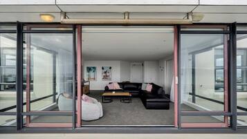 Panoramic Apartment, Ocean View | Living area | Flat-screen TV