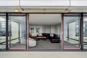 Panoramic Apartment, Ocean View | Living area | Flat-screen TV