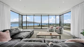 Panoramic Apartment, Ocean View | Living area | Flat-screen TV