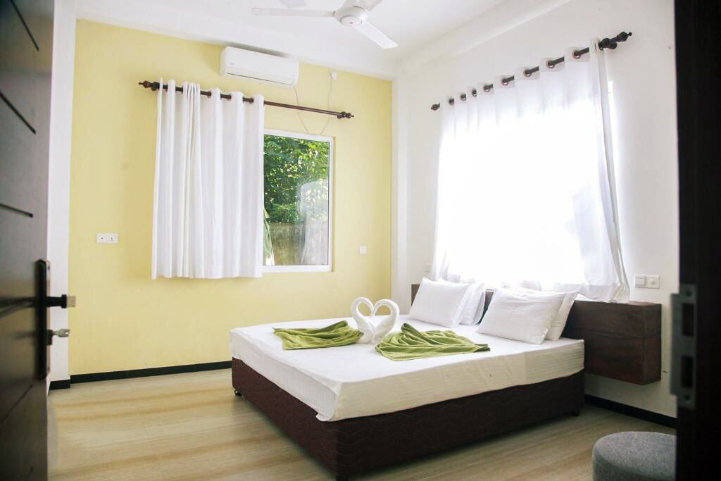 Deluxe Double Room, Garden View | Desk, laptop workspace, free WiFi, bed sheets