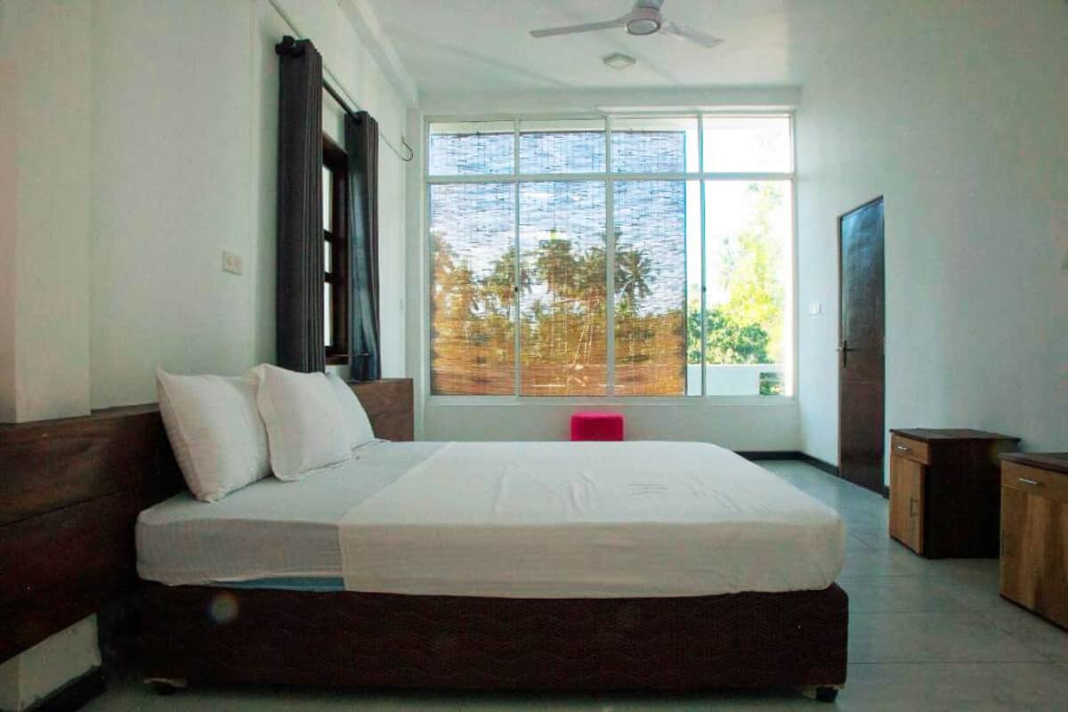 Deluxe Double Room, Garden View | Desk, laptop workspace, free WiFi