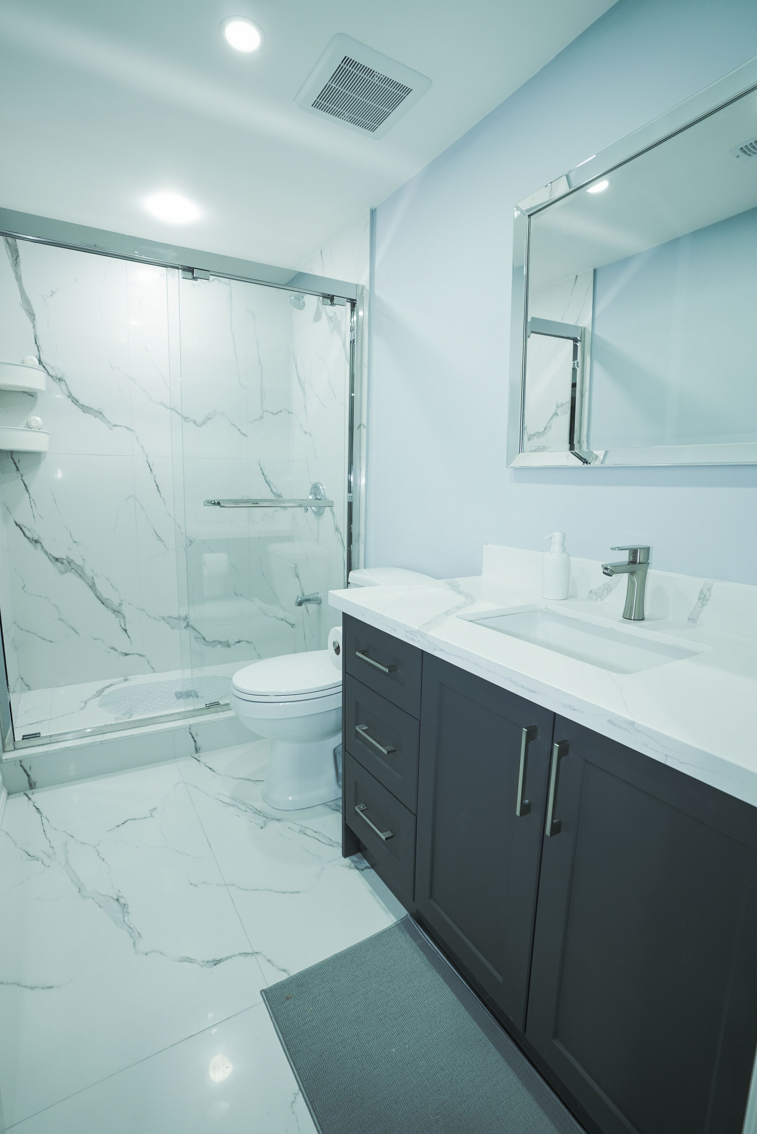 Shower, towels, soap, toilet paper