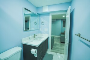 Shower, towels, soap, toilet paper