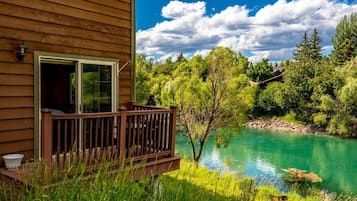 Deluxe Room, 1 King Bed, Balcony, River View | Property grounds