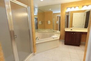 Jetted bath, hair dryer, towels, soap