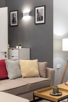 Apartment, 1 Queen Bed with Sofa bed, Air conditioning | Living area