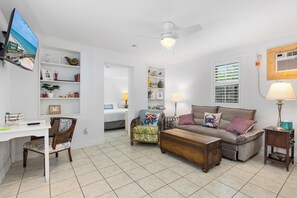 TV, fireplace - The CrabTrap B • 1BR Suite + Sleeper Sofa • Beach (Flagler Beach)