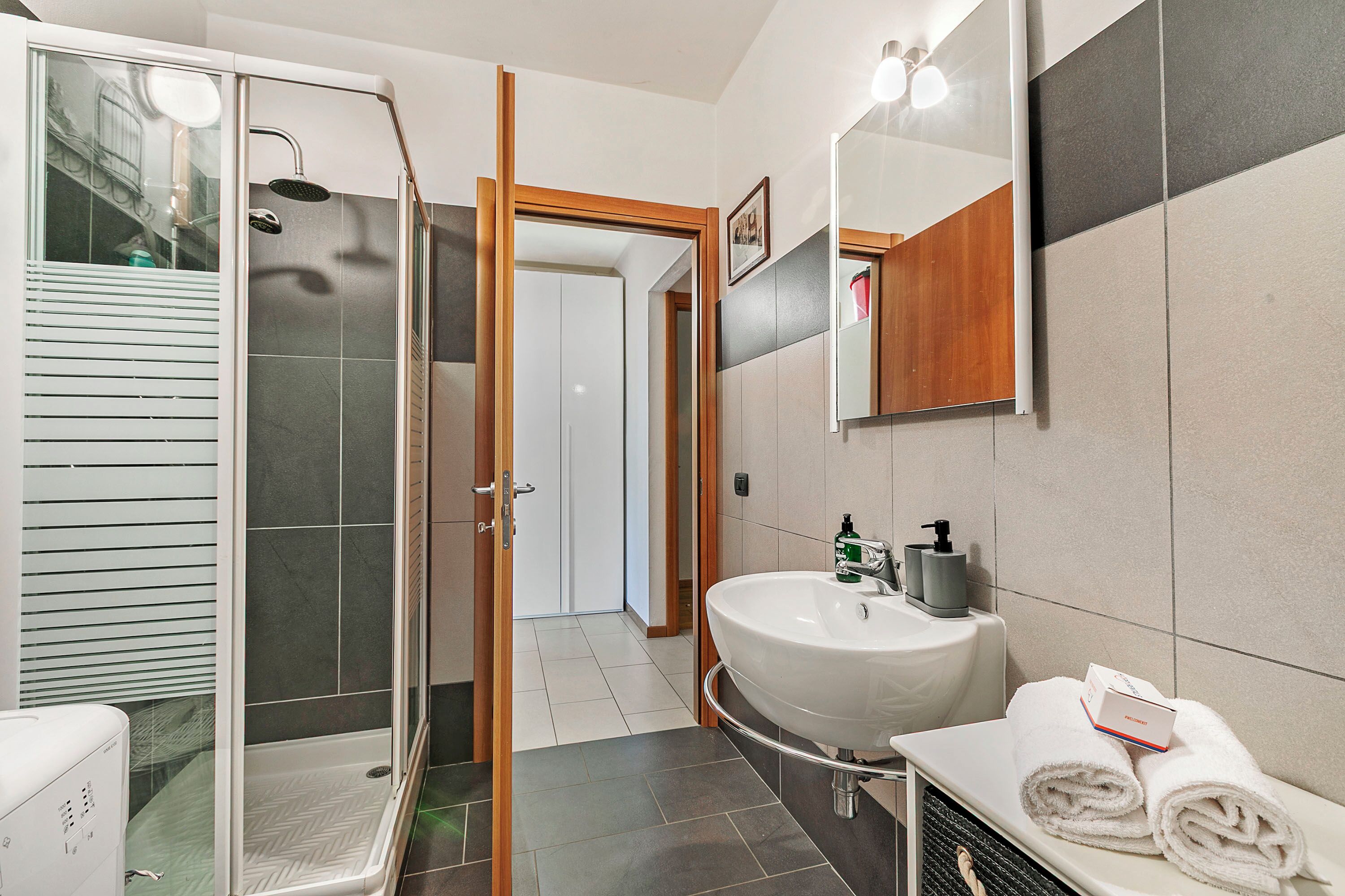 Family Apartment, Multiple Bedrooms (Blu Oltrelago Pool & Lake) | Bathroom | Shower, hair dryer, bidet, towels