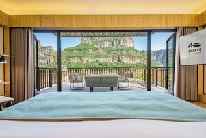 Panoramic Double Room, Mountain View | Minibar, laptop workspace, blackout drapes, soundproofing
