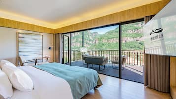 Panoramic Double Room, Mountain View | Minibar, laptop workspace, blackout drapes, soundproofing