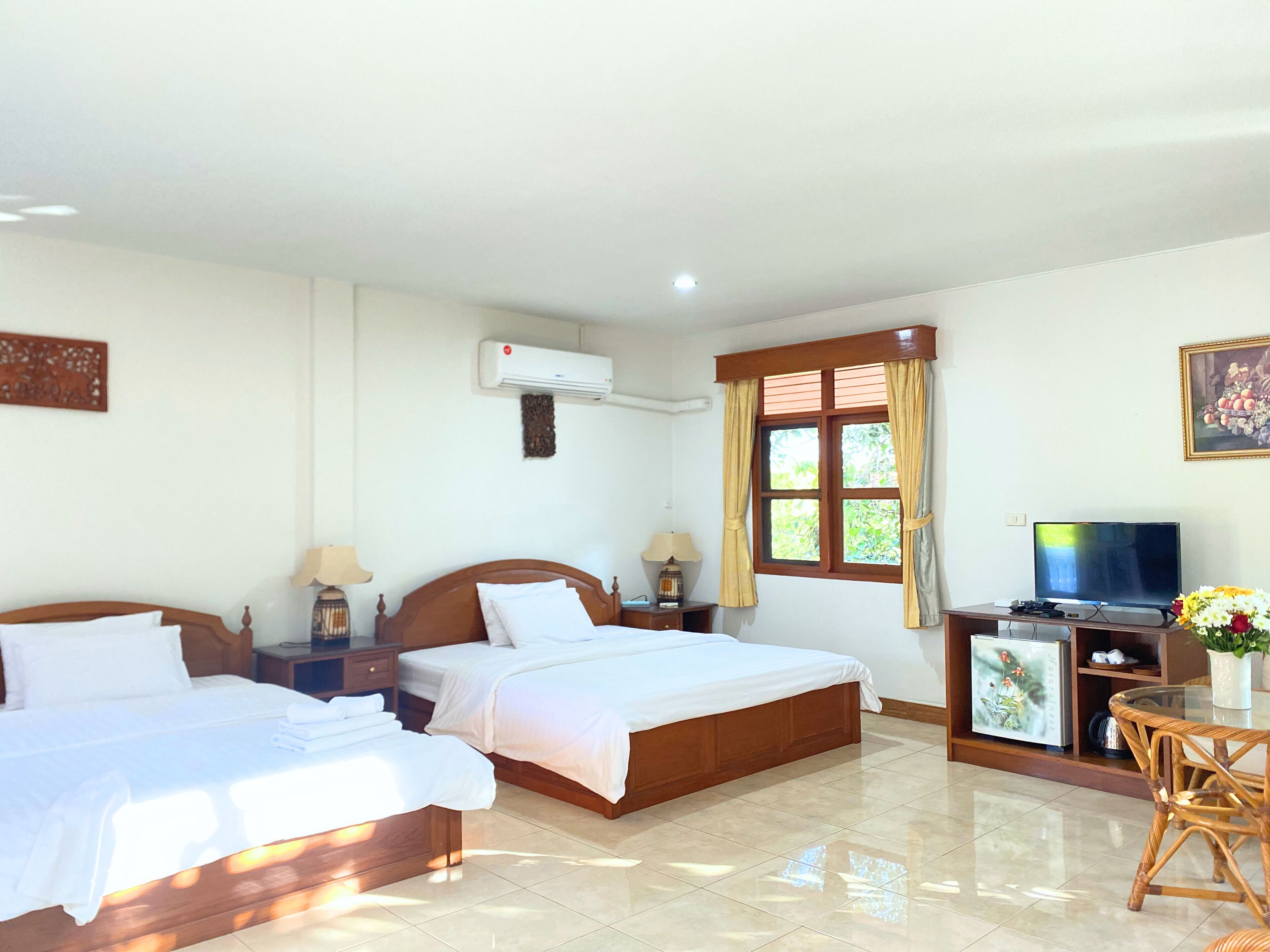 ห้องลักซ์ชัวรี่ดับเบิลหรือทวิน, วิวสวน | ผ้าม่านกันแสง, Wi-Fi ฟรี