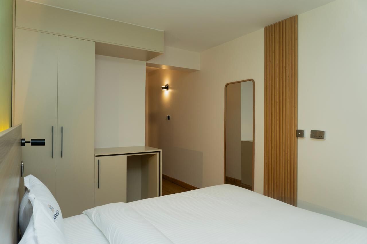 Premium bedding, down comforters, pillowtop beds, desk
